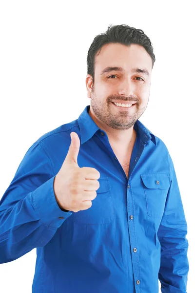 Щасливий випадковий молодий чоловік показує великий палець вгору і посміхається 1 ізольований о — стокове фото