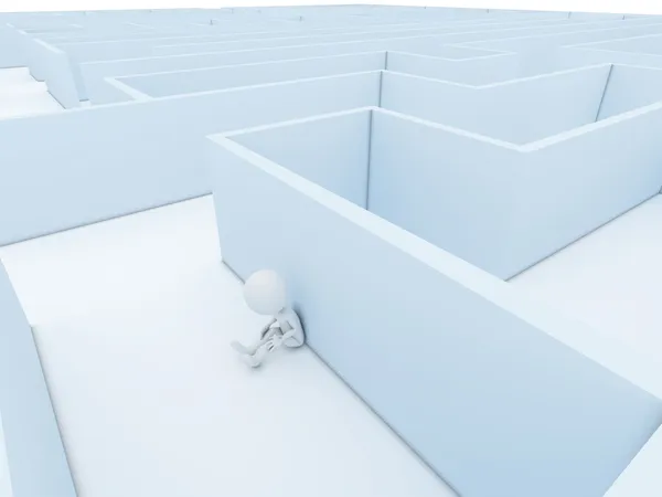 Une personne coincée dans un labyrinthe essayant de trouver une issue — Photo
