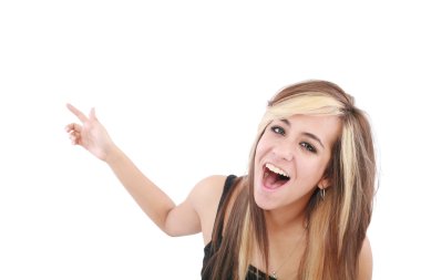 Closeup of cheerful young woman pointing at something interestin clipart