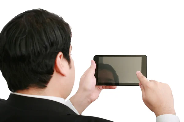 Businessman holding a blank touchpad pc, one finger touches the — Stock Photo, Image