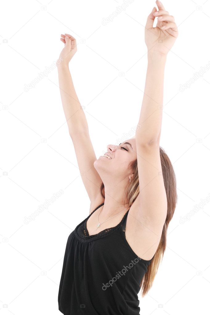 Beautiful happy young woman with her arms in the air. Isolated o