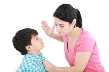 Scared 8 year old boy being abused or abducted by adult female. clipart