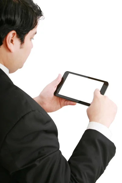 Businessman holding a blank touchpad pc, one finger touches the — Stock Photo, Image