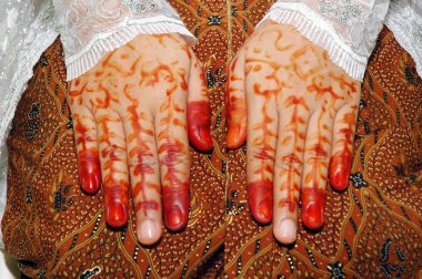 Traditionally the bride's hand tattoo woman Indonesia clipart