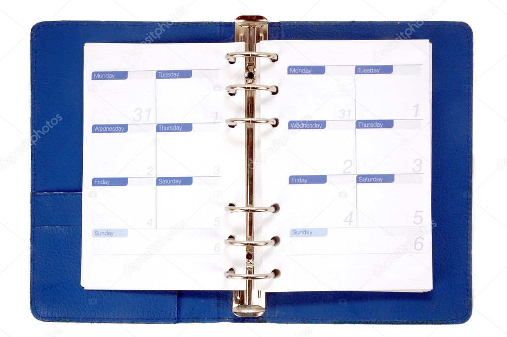 An opened blue leather notebook with weekly schedule paper