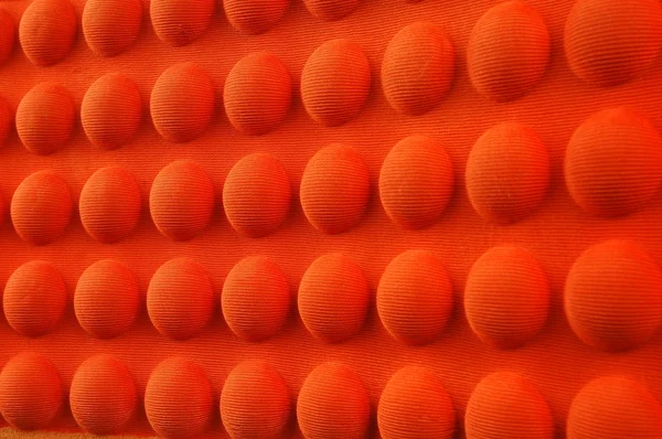 Detailed pattern of orange and brown seat cushion — Stock Photo, Image