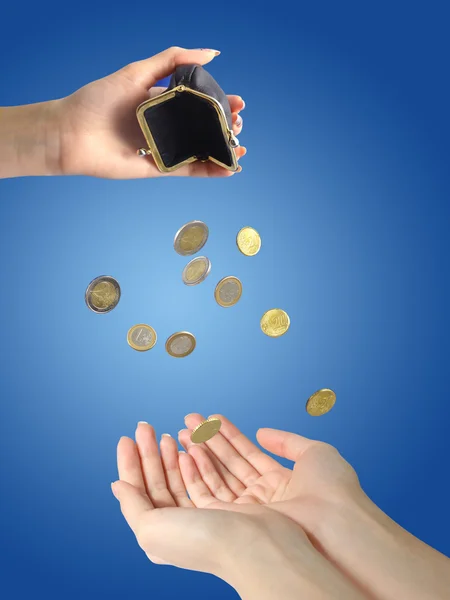 Coins and hands — Stock Photo, Image