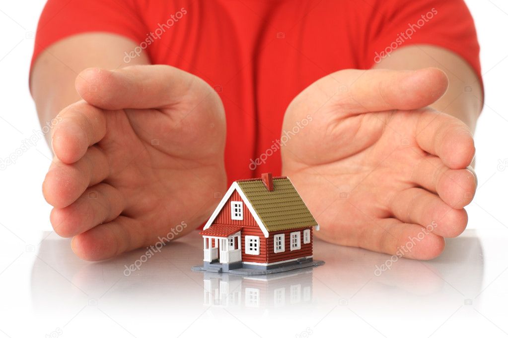 Hands and small house.