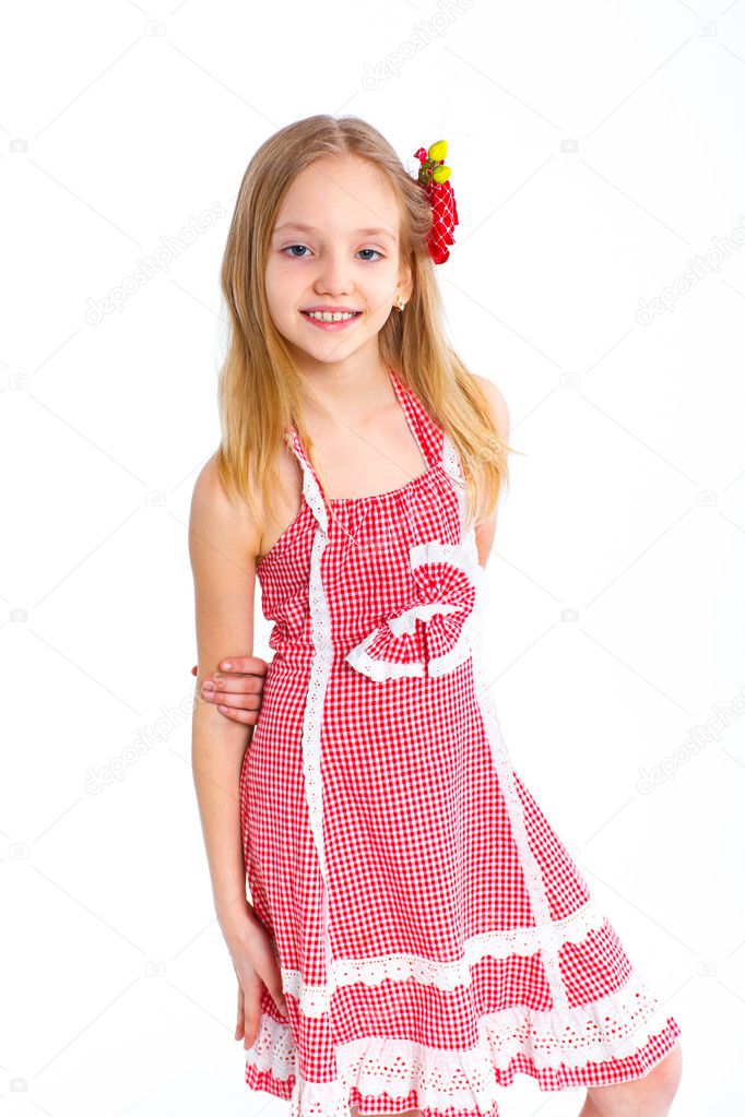Cute little girl in red clothes — Stock Photo © mac_sim 10049712