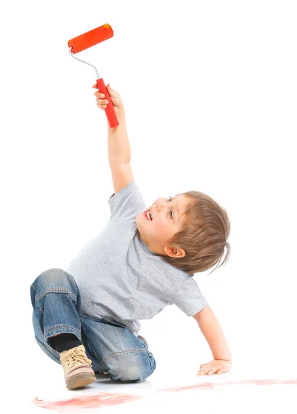 Happy young boy painting over white — Stock Photo, Image