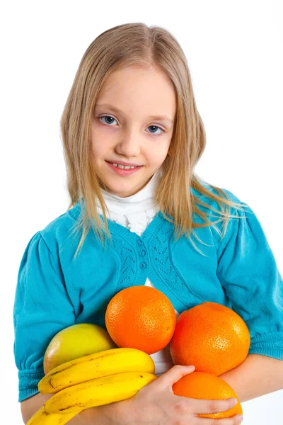 Söt liten flicka med frukter — Stockfoto