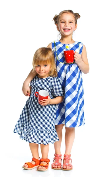Two young beautiful girls with cup — Stock Photo, Image