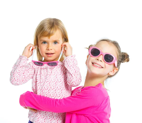 Two young beautiful girls in glasses — Stock Photo, Image