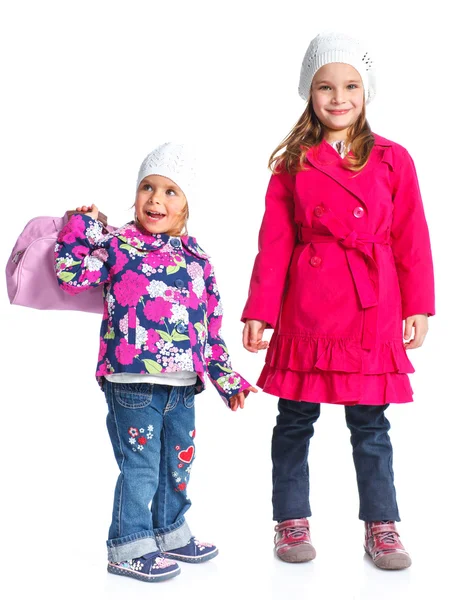 Young beautiful girls in a beret and coat — Stok fotoğraf