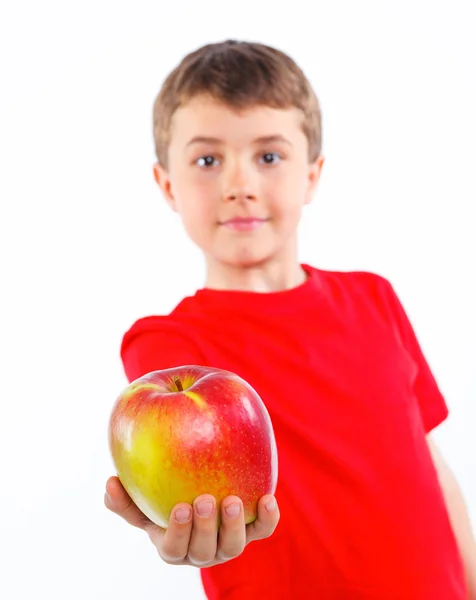 Kleine jongen met apple. — Stockfoto