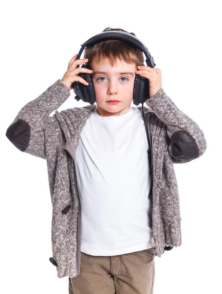 Porträtt av pojke lyssna på musik — Stockfoto
