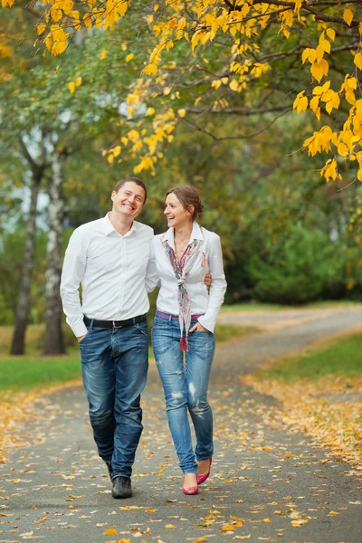 Romantic young beautiful couple on autumn walk — Stock Photo, Image