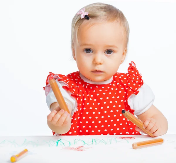 Little girl drawing with crayons — Stock Photo, Image