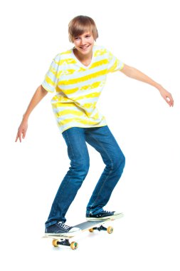 Blond boy on standing on skateboard clipart