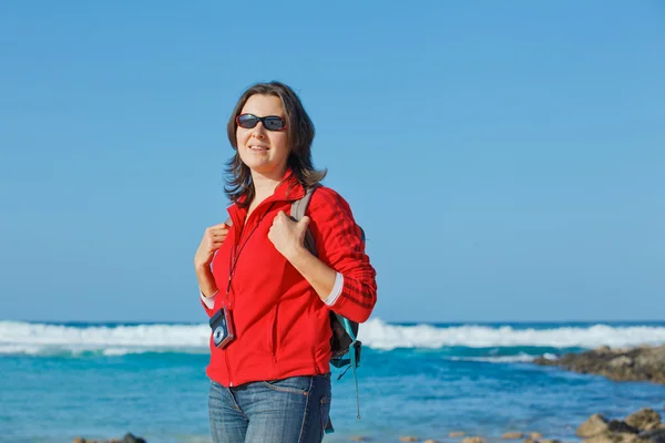 stock image Young woman with backpack