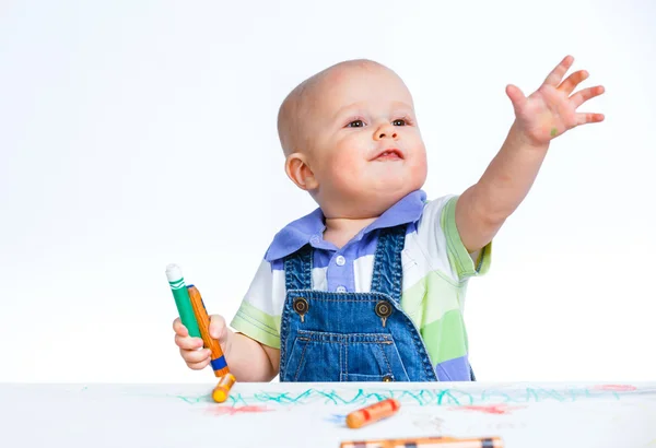 Little boy drawing with crayons — Stock Photo, Image