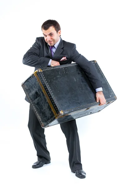 Üzletember, régi nagy bőrönddel — Stock Fotó