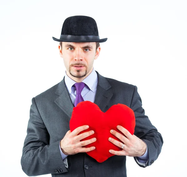 Portrait of a business man with hat and red heart — Stock Photo, Image