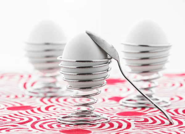 Eggs in metal stands — Stock Photo, Image