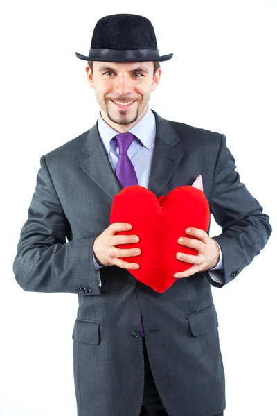 Портрет бизнесмена в шляпе и красном сердце — стоковое фото
