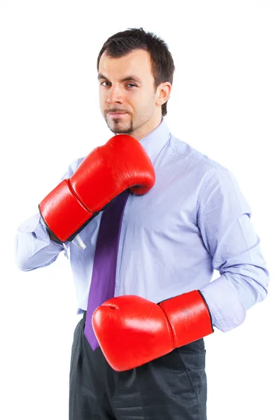 Retrato de un hombre de negocios con guantes de boxeo rojos —  Fotos de Stock