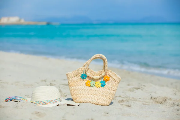 stock image Photo of straw beach bag and hat