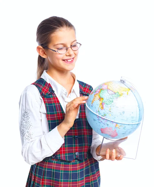Schoolgirl with a globe — Stock Photo, Image