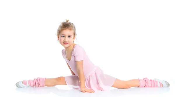 Meisje gymnast geïsoleerd op een witte achtergrond — Stockfoto