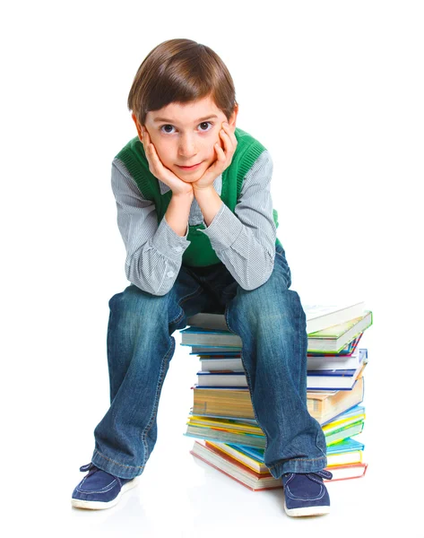 Onderwijs - grappige jongen met boeken. — Stockfoto