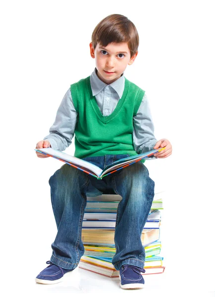 Onderwijs - grappige jongen met boeken. — Stockfoto