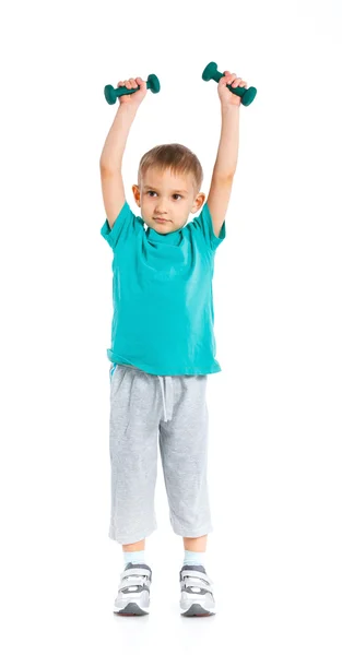 Sporty little boy with dumbbells. — Stock Photo, Image