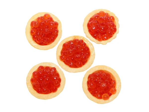Delicioso y fresco caviar rojo en tartaletas — Foto de Stock