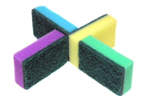 Cuatro esponjas de colores para lavar platos y limpiar —  Fotos de Stock