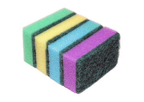 Четыре цветных губки для мытья посуды и чистки — стоковое фото