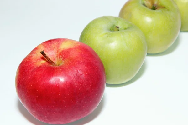 One red and two green delicious apple — Stock Photo, Image
