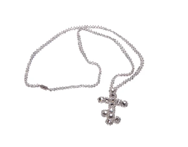 Cruz cristiana de diamantes de imitación en una cadena —  Fotos de Stock