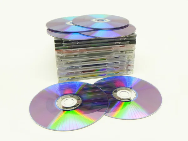 Комплект диск DVD на белом фоне в упаковке — стоковое фото