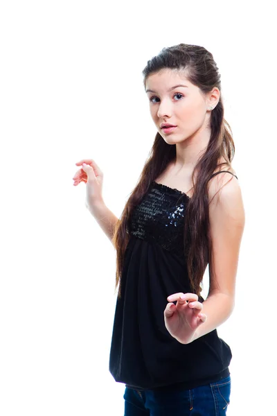 Menina adolescente bonita com longos cabelos escuros em branco isolado — Fotografia de Stock