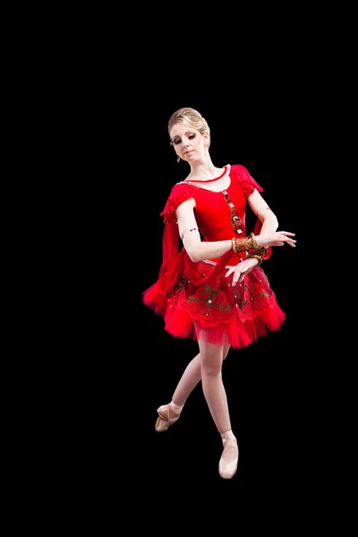 芭蕾舞女演员身穿红色短裙摆上孤立黑 — 图库照片