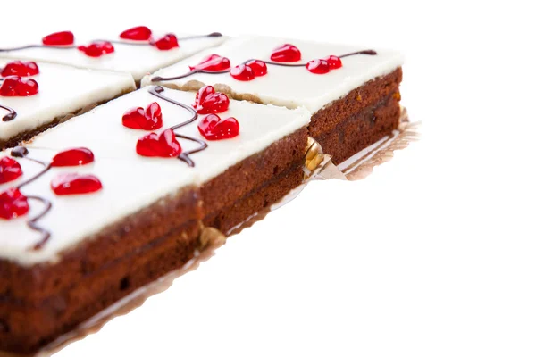 Tortas con corazones de gelatina en blanco aislado — Foto de Stock