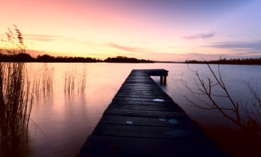 Pier in sunset clipart