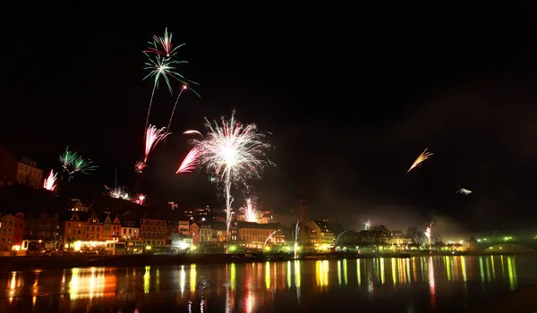 stock image Colorful fireworks close to river