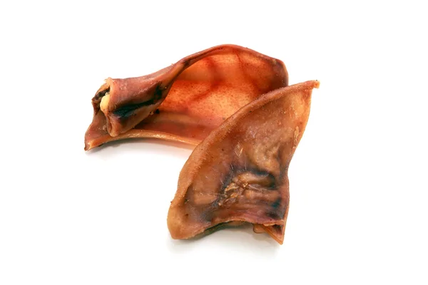 Dog chews - dry pigs ears — Stock Photo, Image