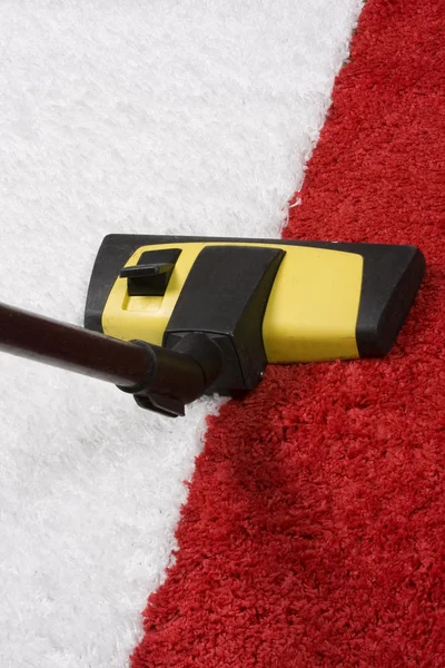 Tube cleaner on the carpet — Stock Photo, Image