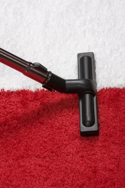Limpiador de tubos en la alfombra — Foto de Stock